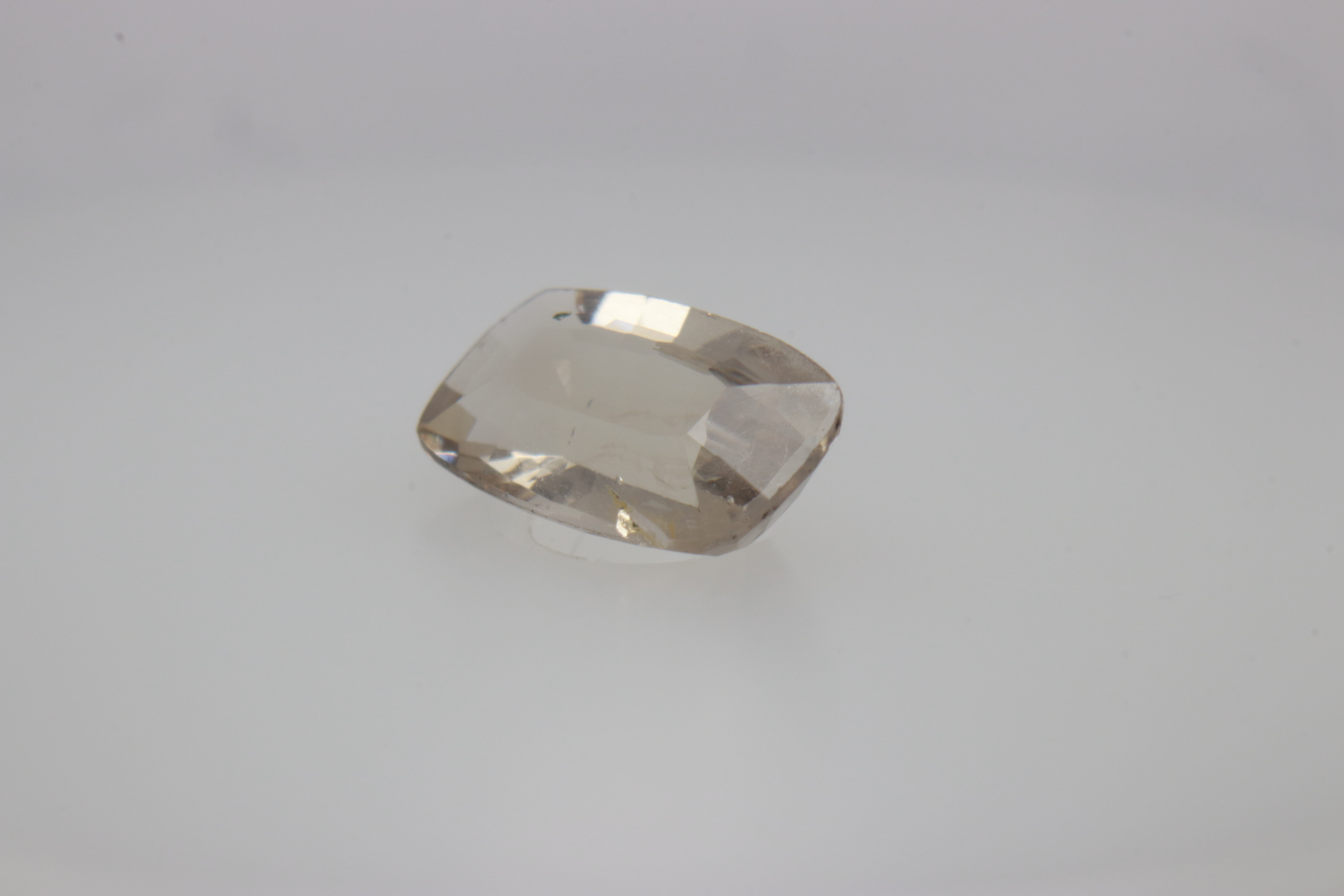 0.7ct White - Off Spinel SI1 Fancy Cushion Shape (7.3x4.4x2.8 mm) Unheated gemstone from Sri Lanka