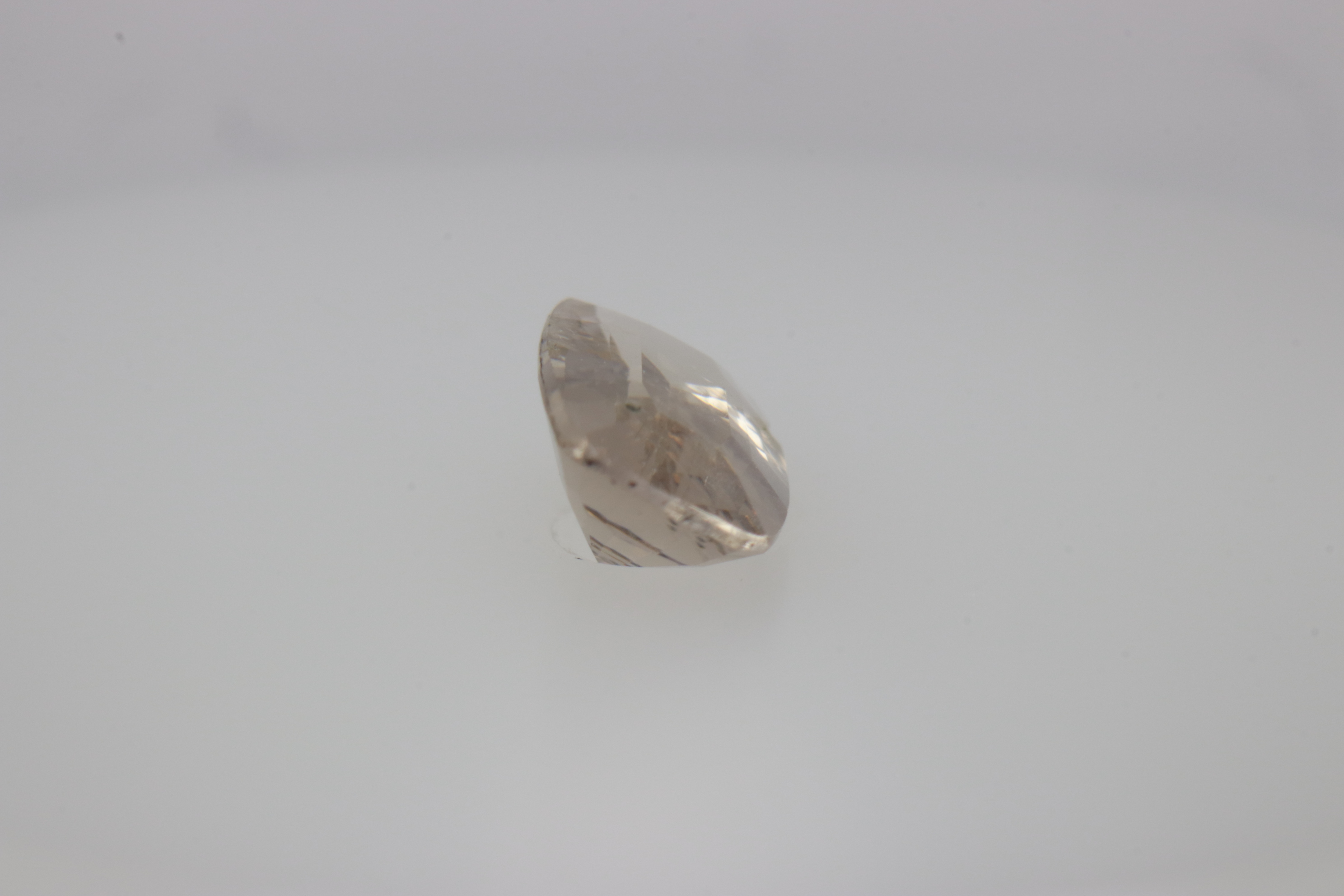 0.7ct White - Off Spinel SI1 Fancy Cushion Shape (7.3x4.4x2.8 mm) Unheated gemstone from Sri Lanka