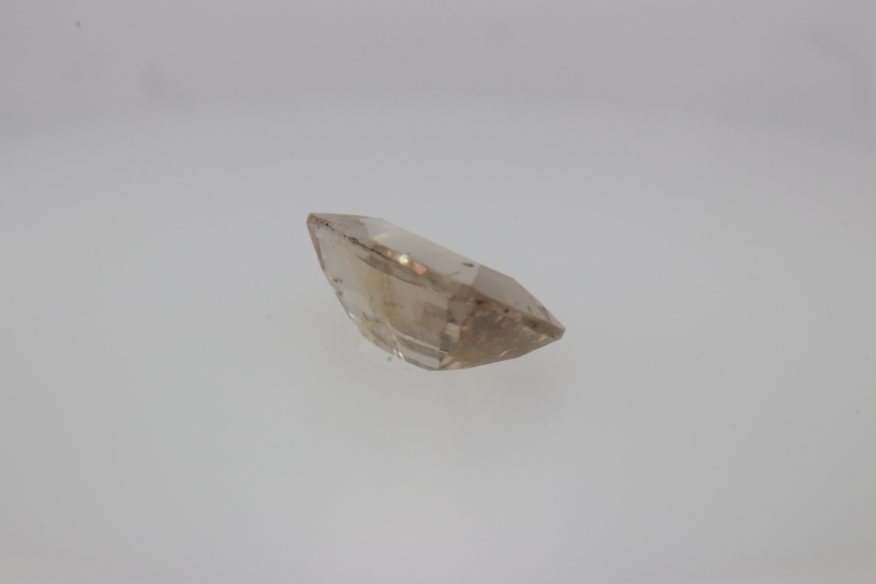 0.7ct White - Off Spinel SI1 Fancy Cushion Shape (7.3x4.4x2.8 mm) Unheated gemstone from Sri Lanka