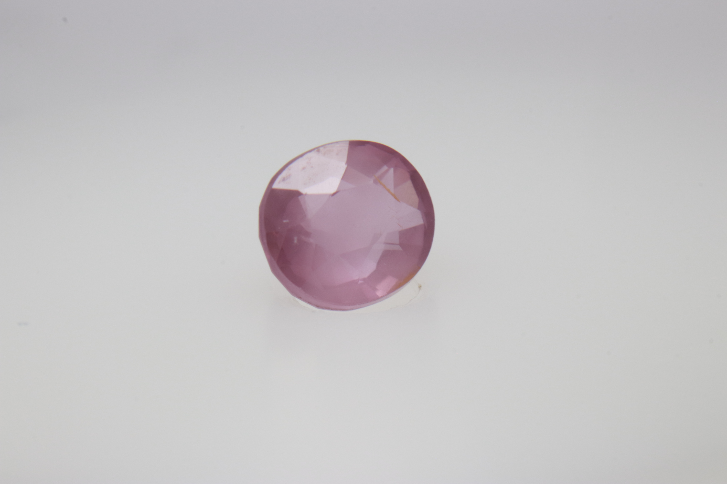 0.6ct Hot Pink Padparadscha VVS Oval Shape (5.2x4.6x3.1 mm) Unheated gemstone from Sri Lanka