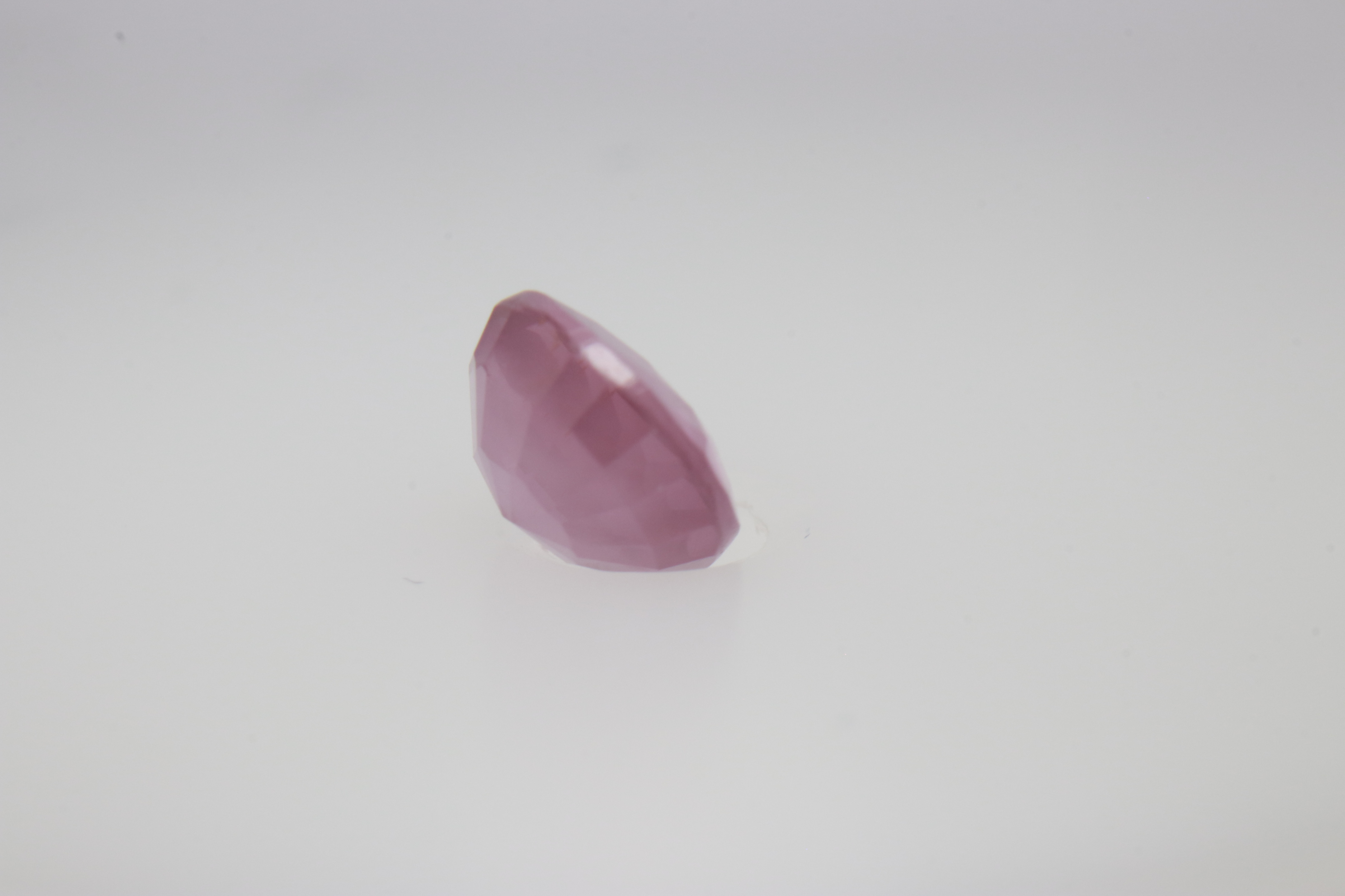 0.6ct Hot Pink Padparadscha VVS Oval Shape (5.2x4.6x3.1 mm) Unheated gemstone from Sri Lanka