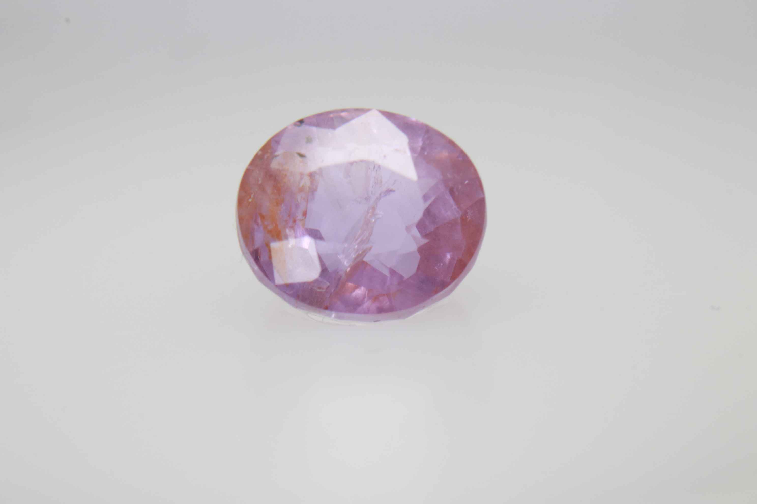 1.6ct Light Pink Padparadscha VVS1 Oval Shape (6.6x5.9x4.2 mm) Unheated gemstone from Sri Lanka