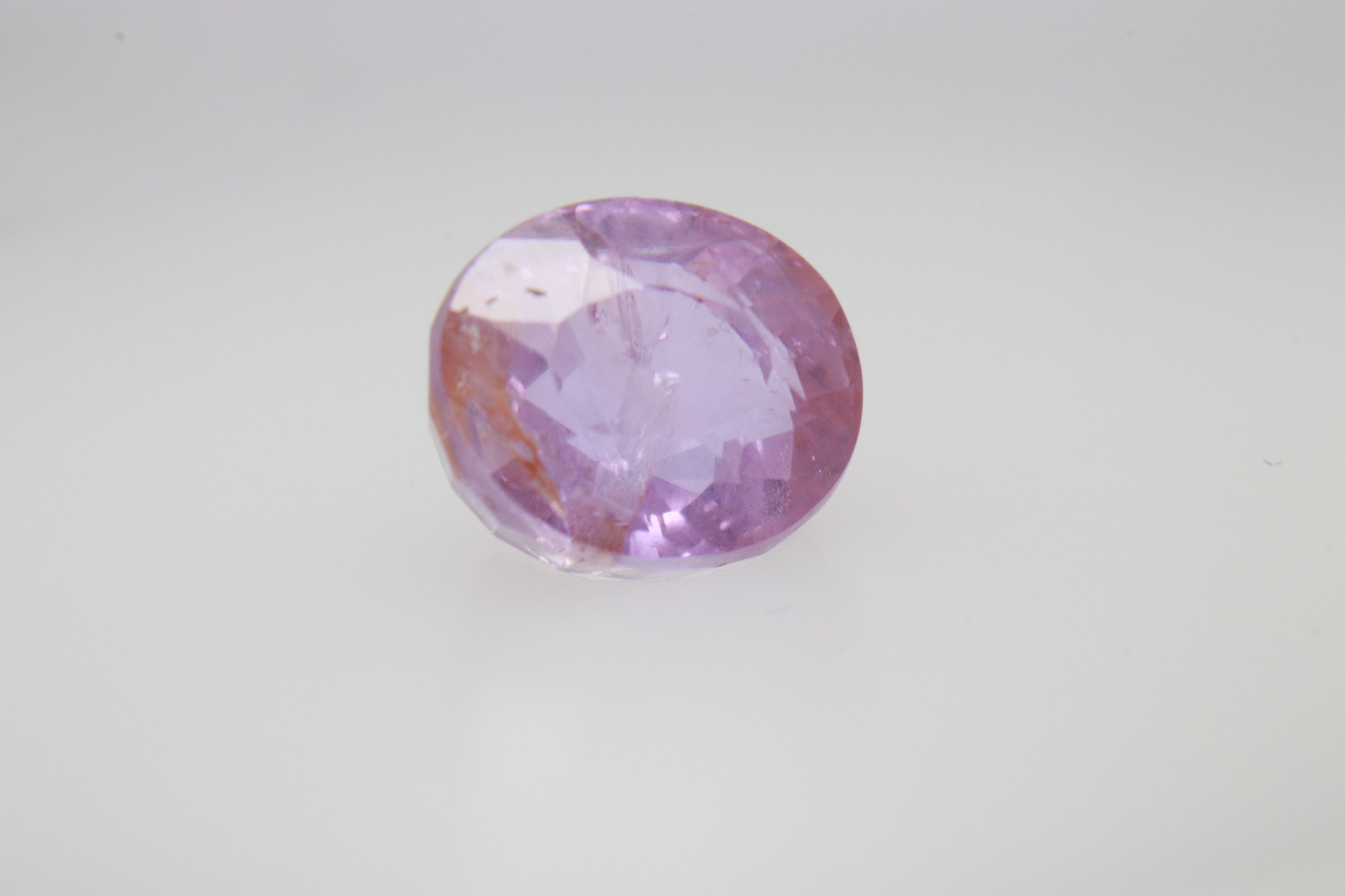 1.6ct Light Pink Padparadscha VVS1 Oval Shape (6.6x5.9x4.2 mm) Unheated gemstone from Sri Lanka