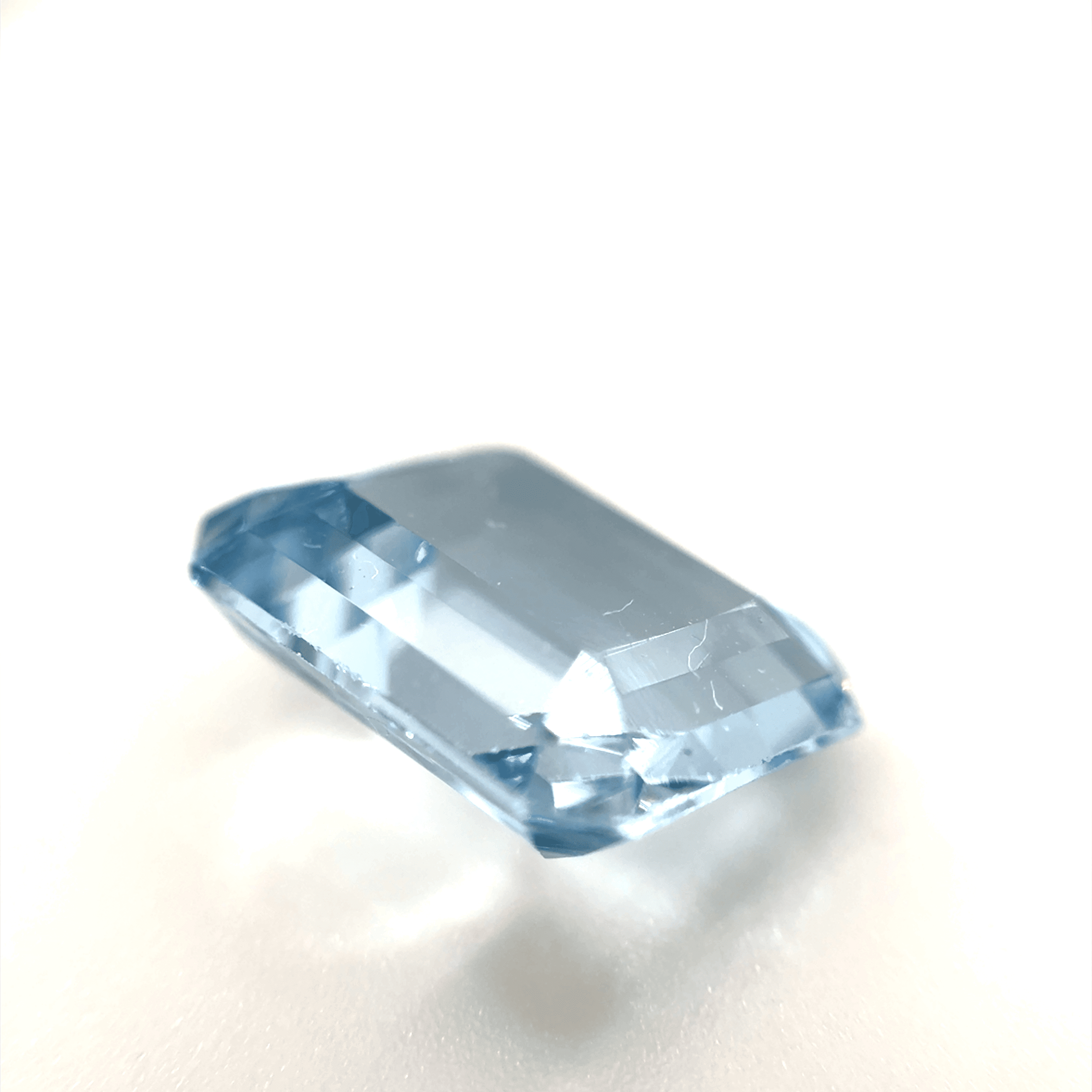6.5ct Light Blue Topaz Flawless (fl) Fluorescence Emerald Cut (10x11.09x5.9 mm) Unheated gemstone